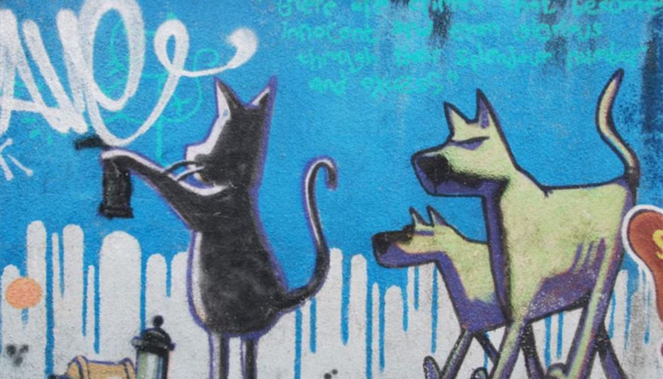Cat and Dog mural by Banksy